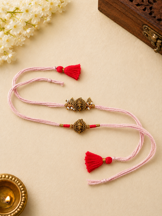 Pink Ganesha Rakhi Set with Red Tassel