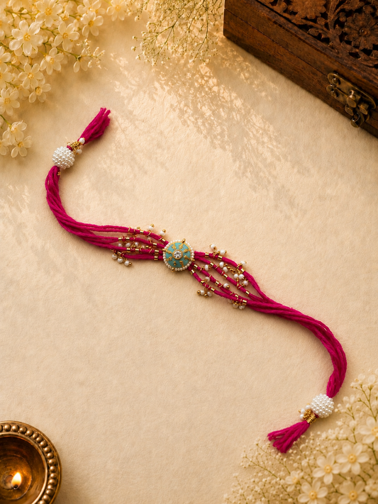 Pink Multi-Strand Rakhi with Turquoise Pendant & Pearl Tassels for Bhabhi
