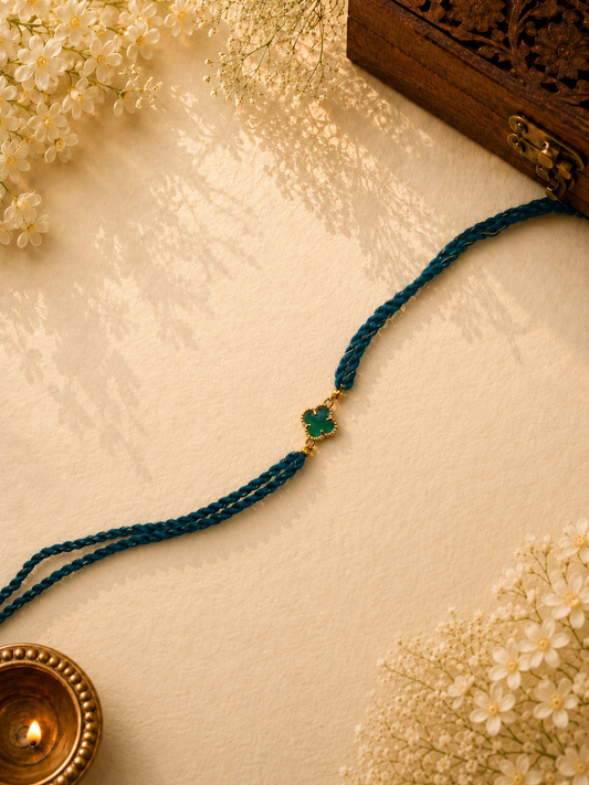 Teal Thread Rakhi with Green Clover Stone for Brother