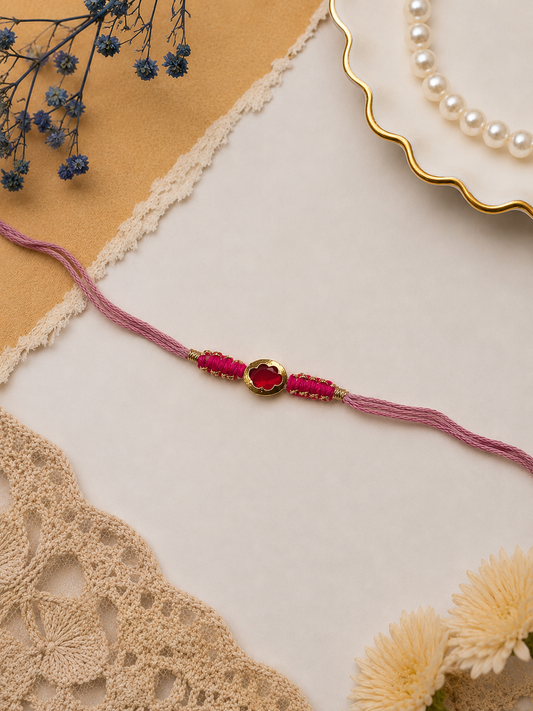 Designer Rakhi with Ruby-Red Stone & Gold Antique Charm | Handmade Mauve Thread Rakhi for Brother