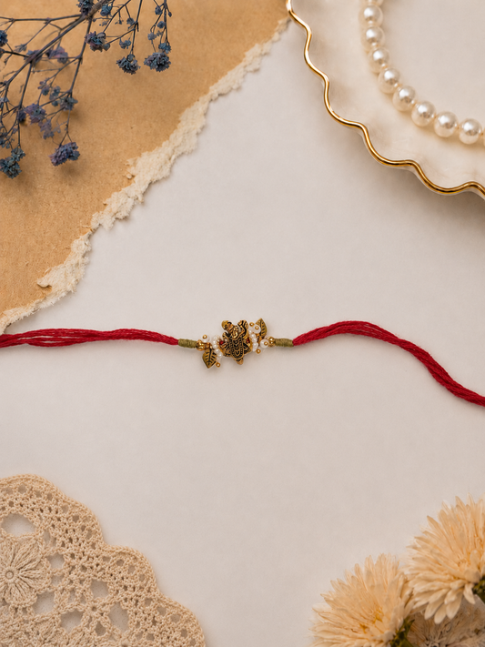 Red Shreenath Ji  Bhabhi Rakhi with Pearl Leaf Charms Gift Set