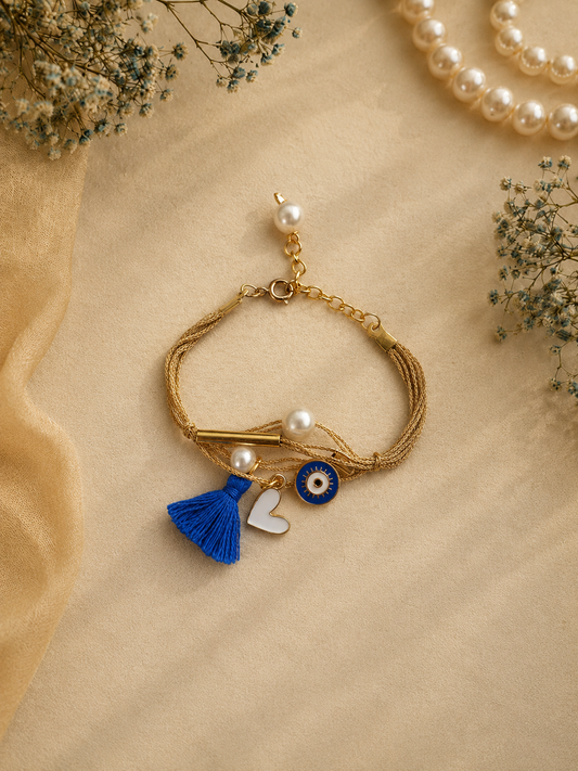 Gold Evil Eye Bhabhi Bracelet Rakhi with Blue Tassel Gift