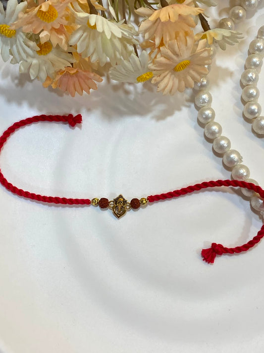 Ganesha Rudraksha Rakhi – Traditional Red Thread Rakhi for Bhai