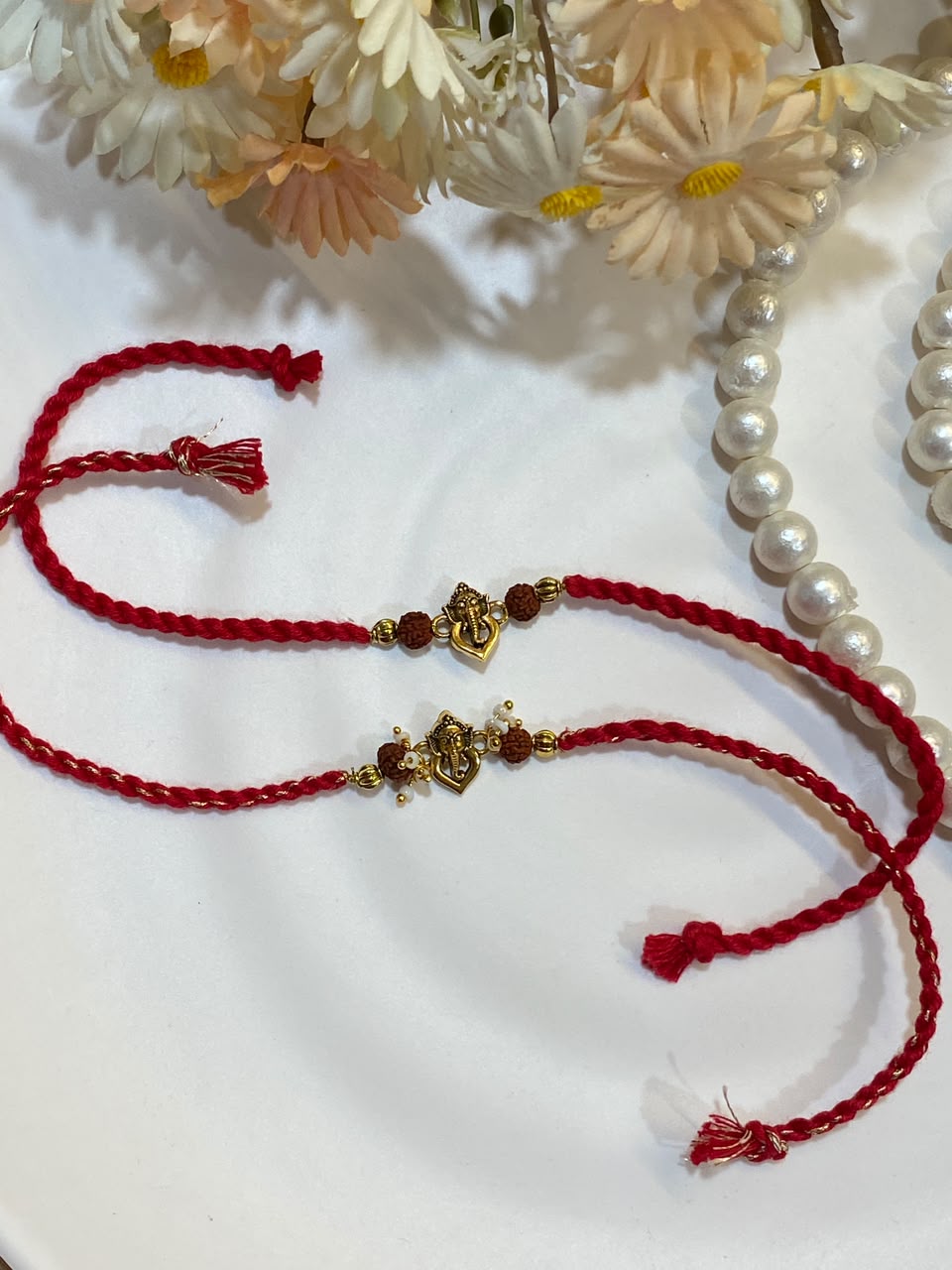 Ganesha Rudraksha Rakhi Set of 2 – Traditional Red Thread Rakhi for Brothers